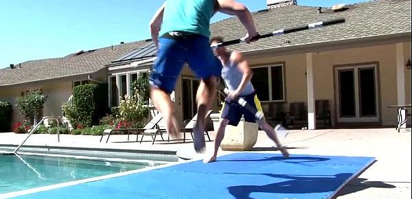  Gay muscular jocks sword fighting by the pool
